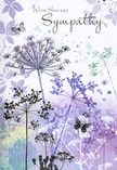 This sympathy card presents a serene floral scene that feels as hushed and reflective as an early stroll through Crayford on a misty morning. Slender wildflower stems rise gracefully from the bottom edge, their lines so fine they seem to waver like grasses in a light wind. Atop each stem, umbelliferous flower heads open into airy crowns of tiny blossoms, painted in layered shades of lavender, cool indigo, and washed-out blue-grey. The artist uses a gentle watercolour technique, letting pigments bleed softly into one another so the flowers appear both detailed and dreamlike at once. Behind them, a diffuse backdrop of silvery green and smokey mauve suggests a distant meadow fading into soft focus, with no hard horizon to break the calm. Here and there, faint silhouettes of additional stems and leaves peek through the misty tones, adding depth without disturbing the tranquillity. Two delicate butterflies, wings lightly tipped with lilac and white, float near the tallest blooms, hinting at transformation and the quiet presence of loved ones still felt even after they've gone. The whole composition is cool and calming rather than sombre, shaped by open spaces and fluid lines. From the perspective of a local Crayford florist, this design evokes the gentle, natural beauty we see in untamed corners along the River Cray-subtle, enduring, and deeply comforting. It's the kind of card we'd choose to accompany a simple, elegant funeral arrangement, sending a message of sympathy that relies not on many words, but on the soft language of flowers and light.